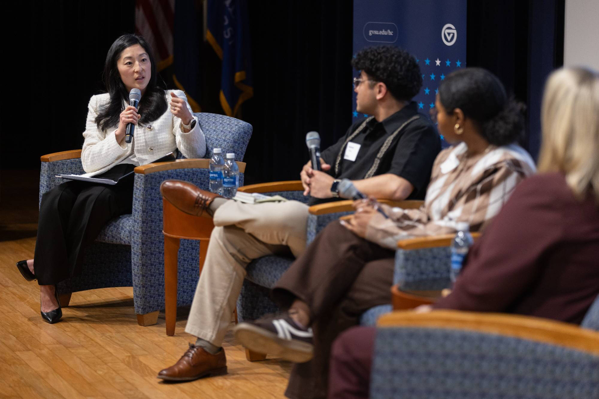 Megan Rydecki asks a question during the event